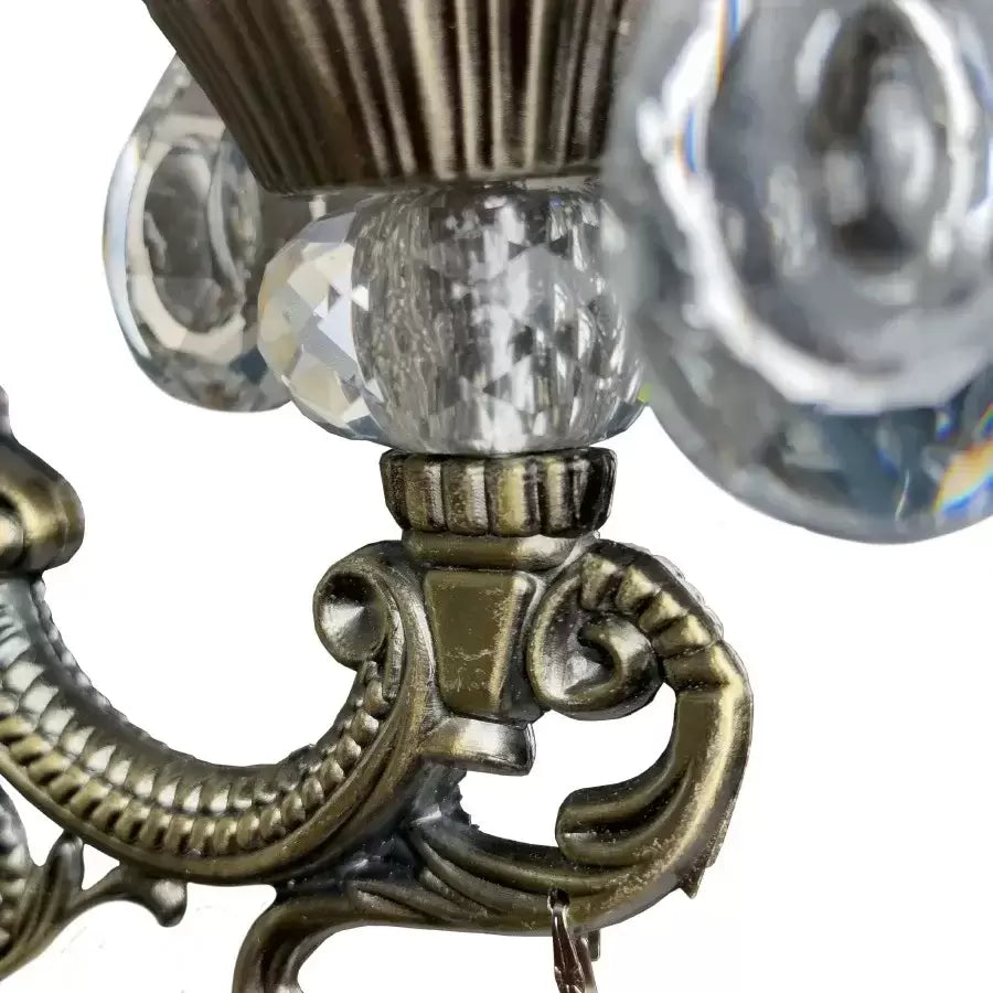 SANSSOUCI Picollo Crystal nástenné svietidlo, 1xE14, starožitná mosadz